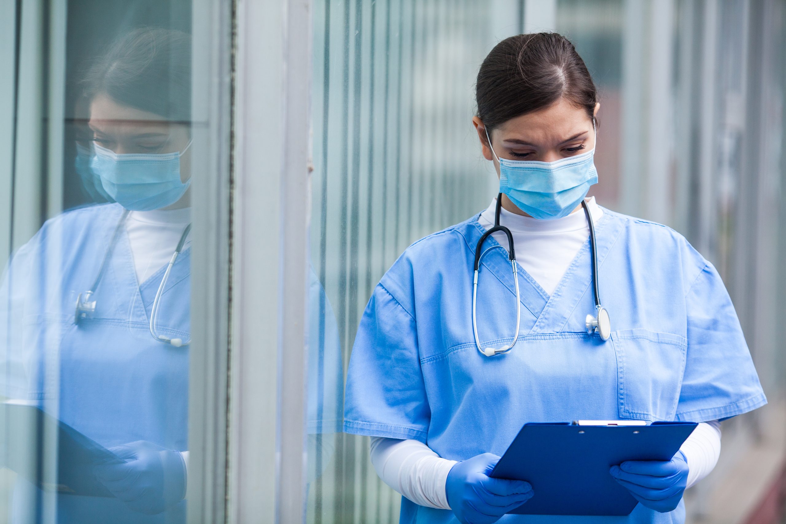 Female,Icu,Doctor,Checking,Patient,Medical,Record,Clipboard,Card,Form,first
